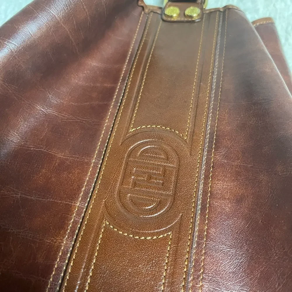 Fortune Duck vintage leather Brown sling back bucket style  bag.
